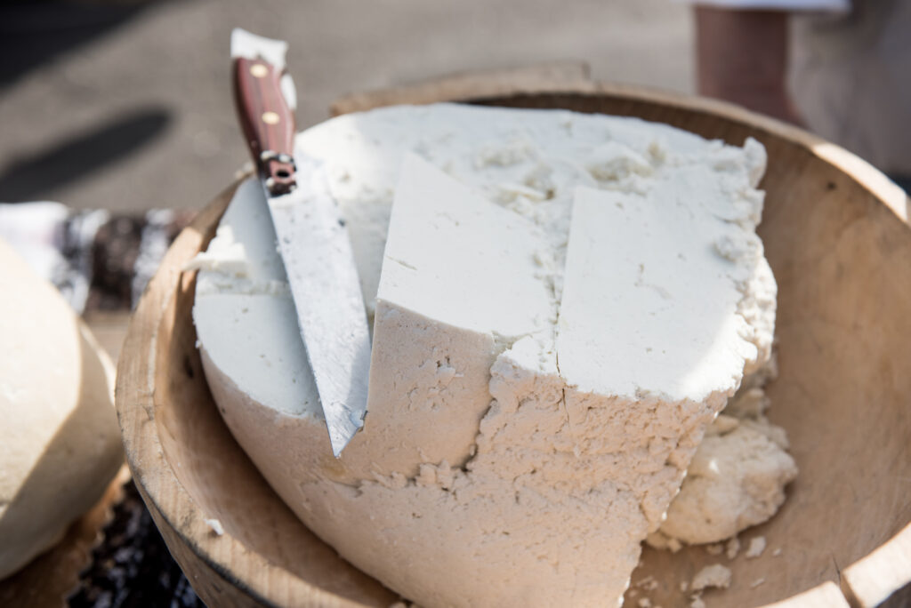 Handmade farm cheese in farmer's market. Transylvania, Romania